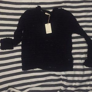 Black hoodie light pullover sweater.